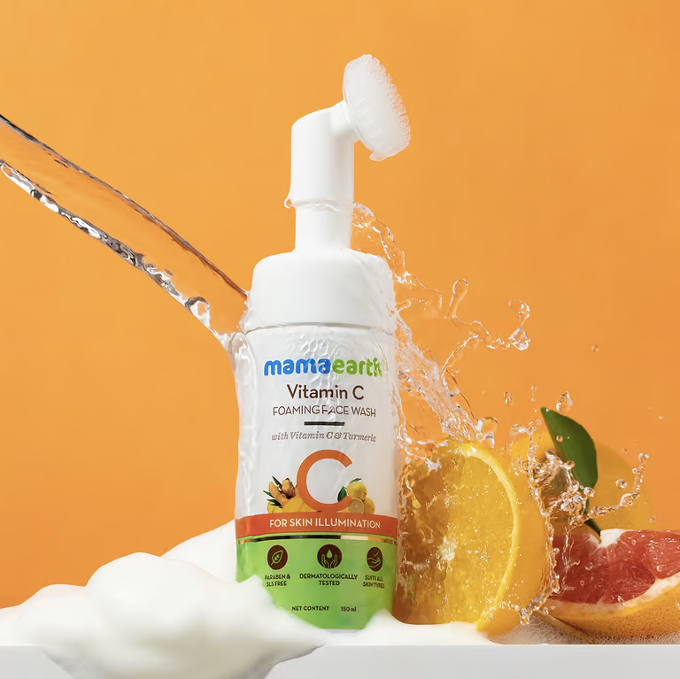 Mamaearth vitamin c foaming face wash with orange colour background